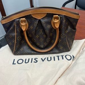 Authentic. Louis Vuitton trovili PM authentic excellent condition dust bag kept